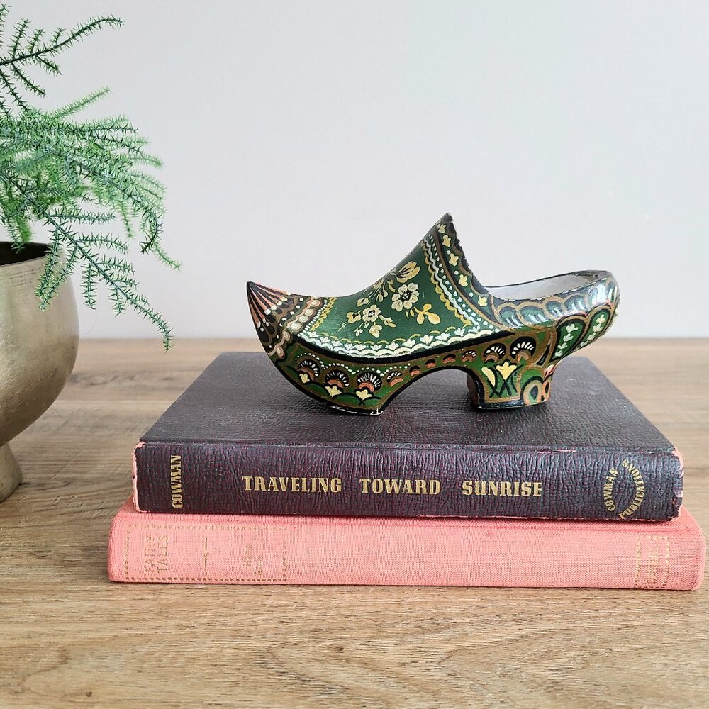 Dutch wooden hand painted shoe figurine with floral design.